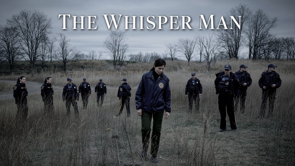 Search party walking through a winter field; The Whisper Man